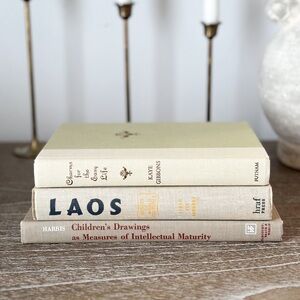 Stack of cream styling books